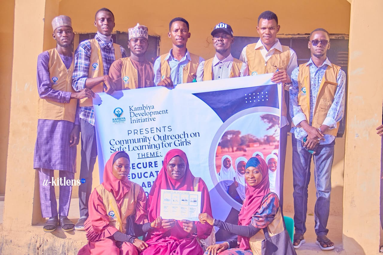 Secure Her Education – girls receiving outreach materials