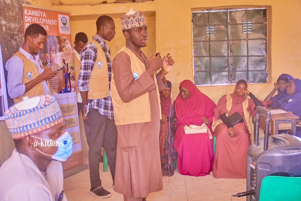 KDI team conducting an indoor outreach session with female students